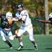 Macomb Lutheran North junior quarterback William Kruse prepares to throw against Father Gabriel Richard on saturday. Daniel Brenner I AnnArbor.com